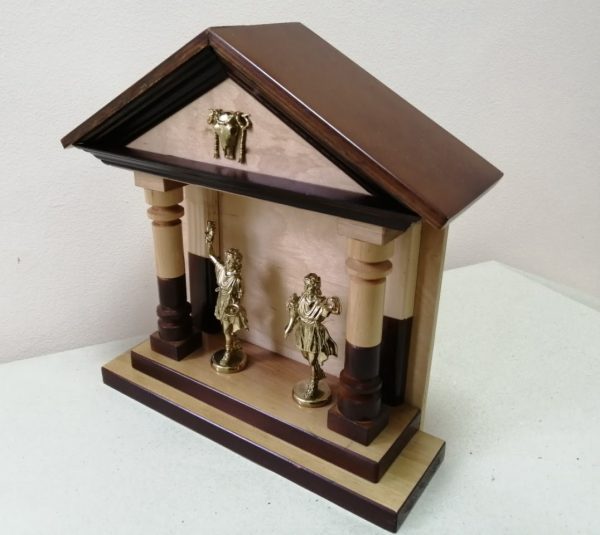 wooden laquered lararium with brass Lares statues and bucranium