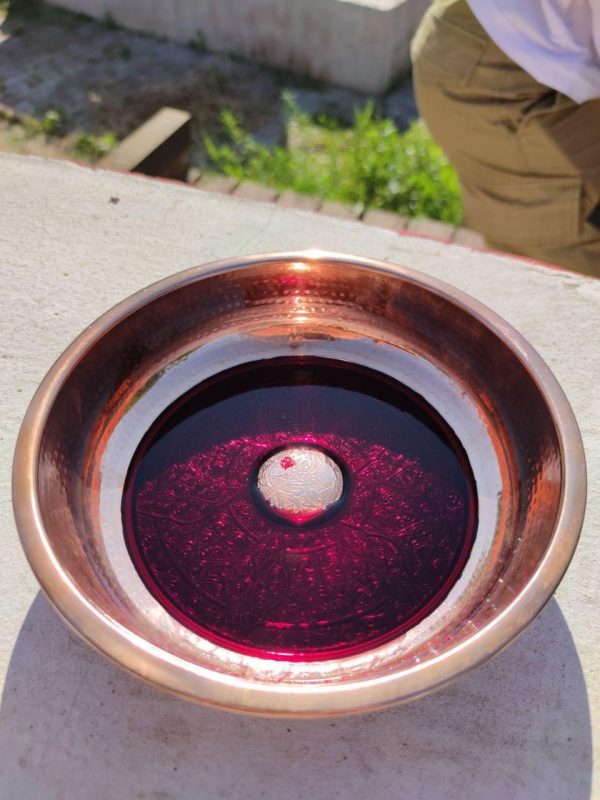 Bronze libation bowl