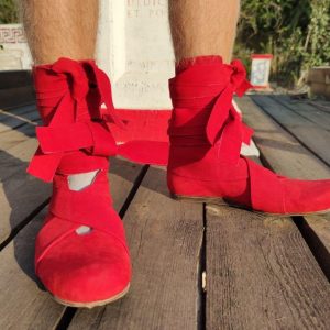 flat-soled Roman boots