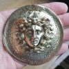 Protective brass medusa medallion