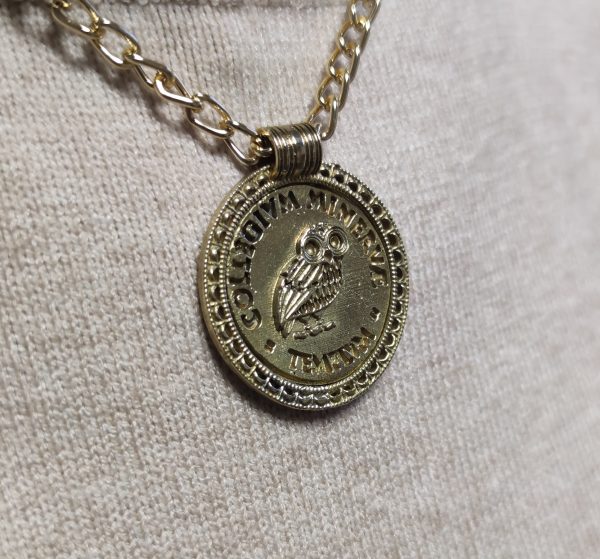 Minerva brass medallion